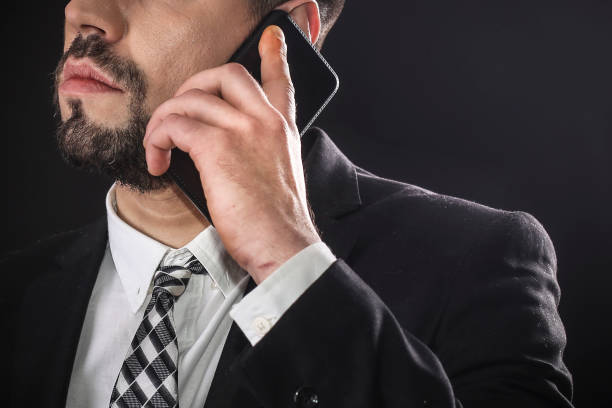 istock Businessman talking on phone 946000542