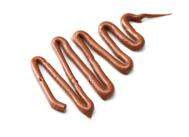 istock milk chocolate sauce isolated on a white background 946001378