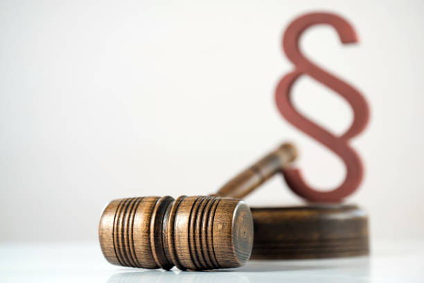 Law symbols on bright background.