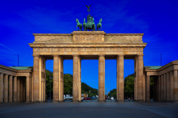 istock The Brandenburg Gate in Berlin at night 946012280