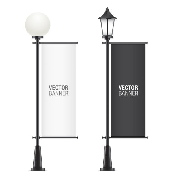Set of vector lamposts with advertising flags. Set of vector lamposts, with black and white advertising flags, isolated on a white backgorund. Vertical promotional flag realistic mockups. pole stock illustrations