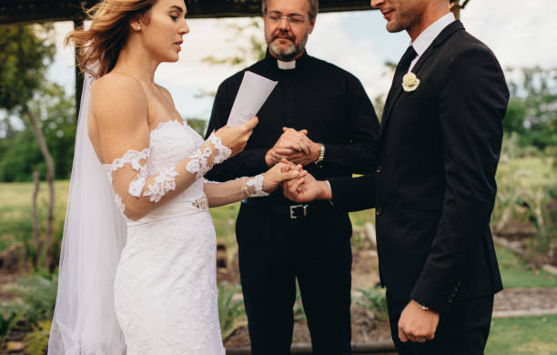 istock Couple exchanging vows on wedding ceremony 946029194