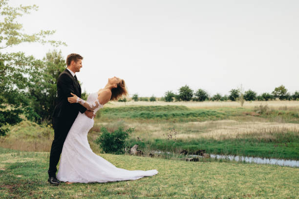 istock Newlyweds on wedding day outdoors 946029372