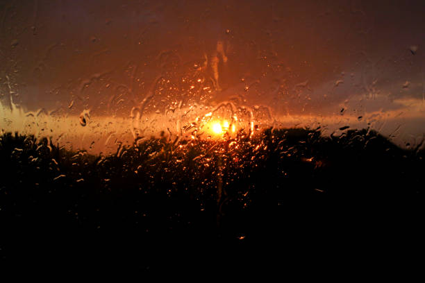 city sunset silhouette through window