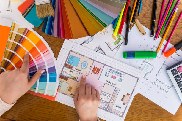 istock Female hands choosing colour for bedroom walls 946032490