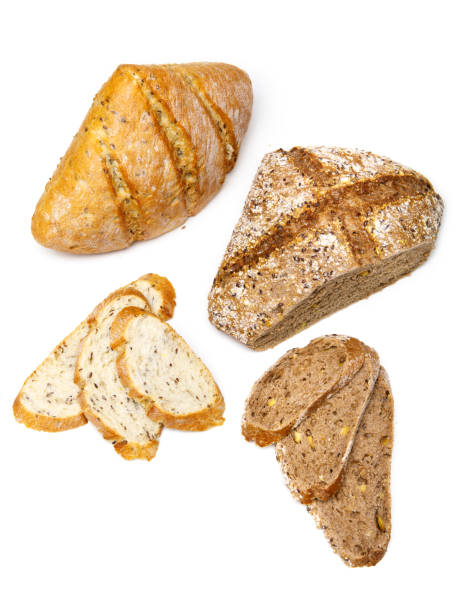 istock Two Fresh homemade bread slice isolated on white background 946035236