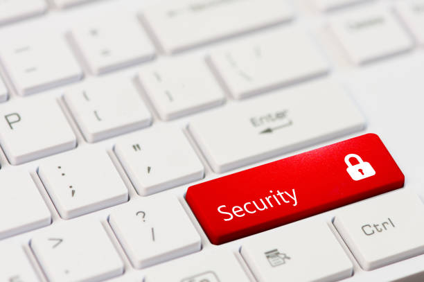 istock red key with text Security and closed padlock icon on white laptop keyboard 946043720
