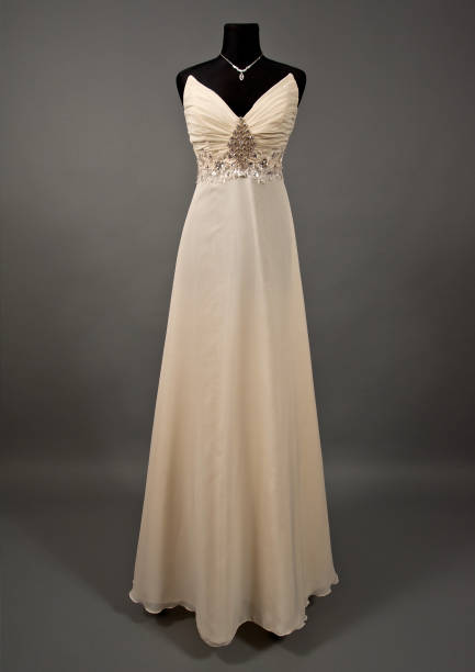 istock ivory Wedding dress on a mannequin 946044050