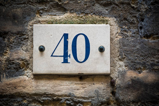 istock Number forty door number on brick wall 946046746