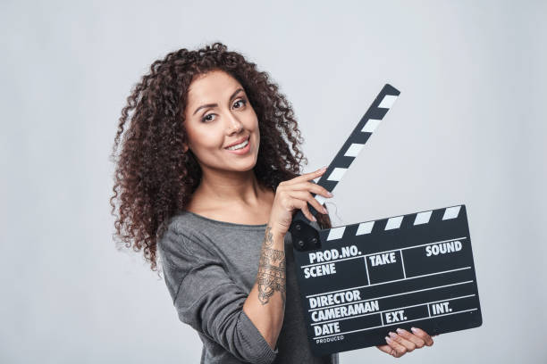 istock Female holding movie clapper board 946055426