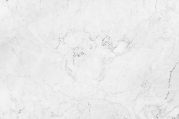istock Abstract white marble background with natural motifs. 946064046