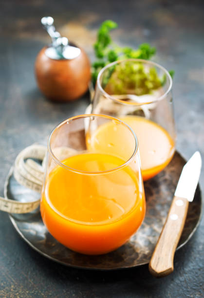 istock carrot juice and fresh carrot 946067610