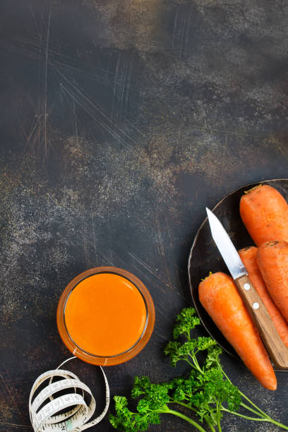istock carrot juice and fresh carrot 946067726