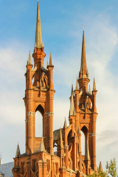 A vertical shot of an ancient church tower in Swiebodzice, Poland
