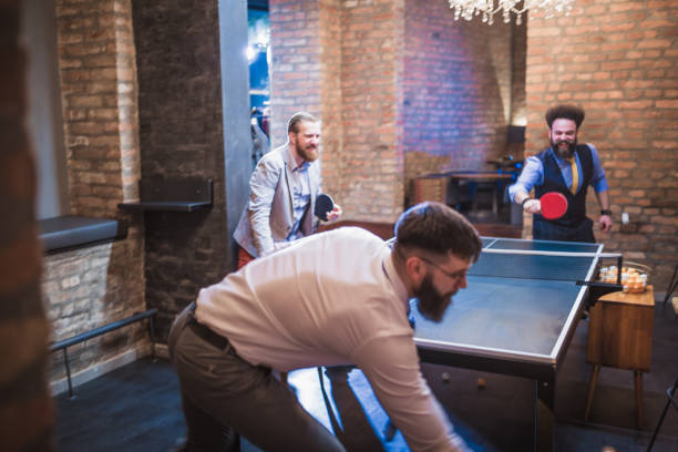 istock Group of young businessman taking break after work, having fun 946078510