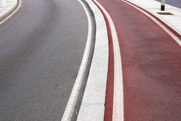 istock Walk way and bicycle lane on the asphalt road surface 946087294