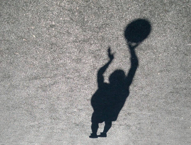 istock shadow of basketball 946091828