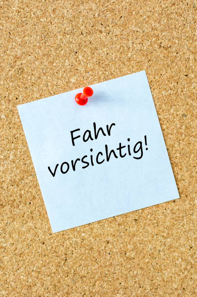 istock Note on a pin board with the German words 