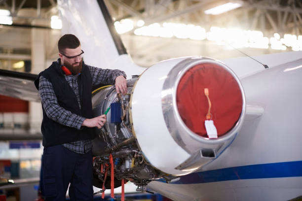 istock Aircraft mechanic in the hangar 946106728