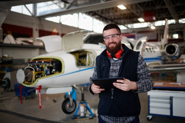 istock Aircraft mechanic in the hangar 946108904