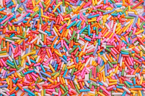 Colorful sugar sprinkle background ,decoration for cake and bakery