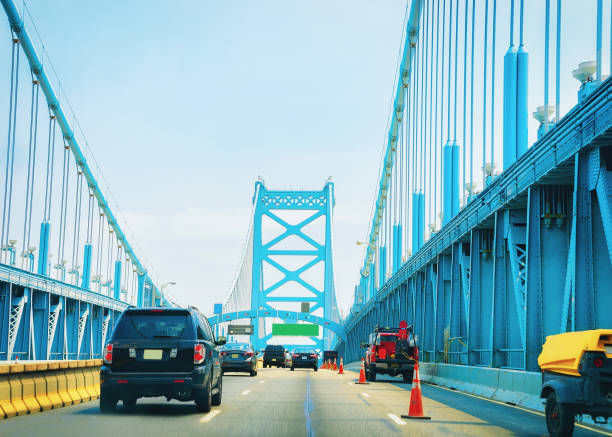 Car on Benjamin Franklin Bridge in New Jersey, America. Focus in motion