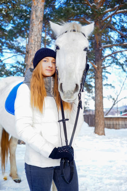 istock Girl with a horse 946119888