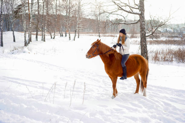 istock Girl riding a horse 946124618