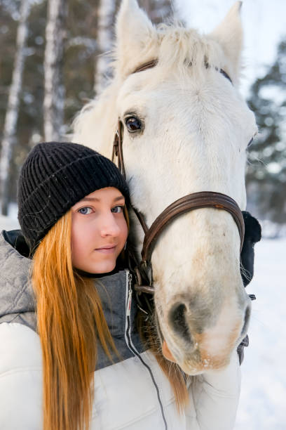 istock Girl with a horse 946126998
