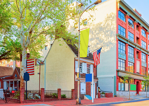 Betsy Ross house and Hanging American Flag, Philadelphia, Pennsylvania, USA. This is a house of the woman who first created the American Flag.