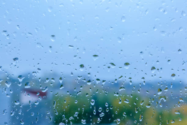 istock Droplets of rain on a window 946137030