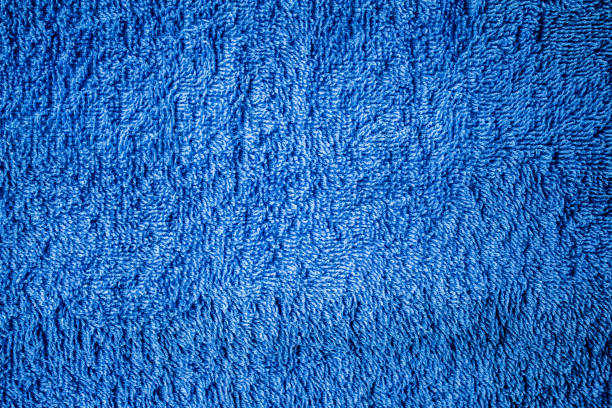 istock Soft blue towel and floor mat fabric texture for business or personal use. 946148452