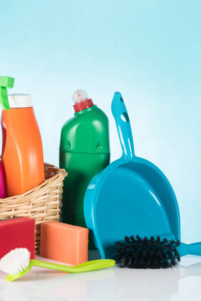 istock Colorful Cleaning Products on blue background 946149168