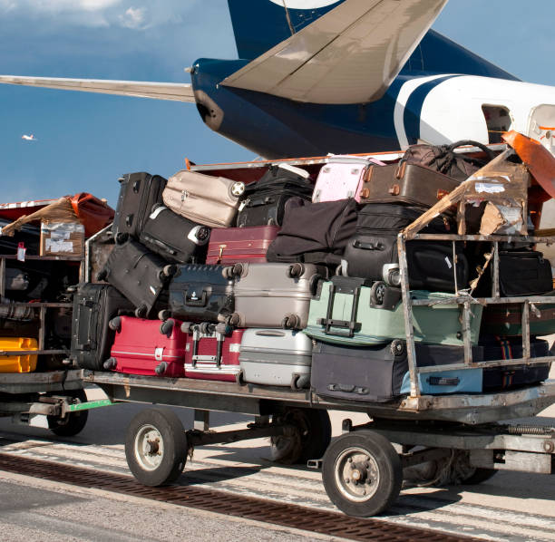 istock airport, baggage on a large cart 946151126