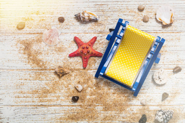 istock Beach accessories on wooden board 946160526
