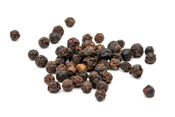 istock Black peppercorn seeds 946164478