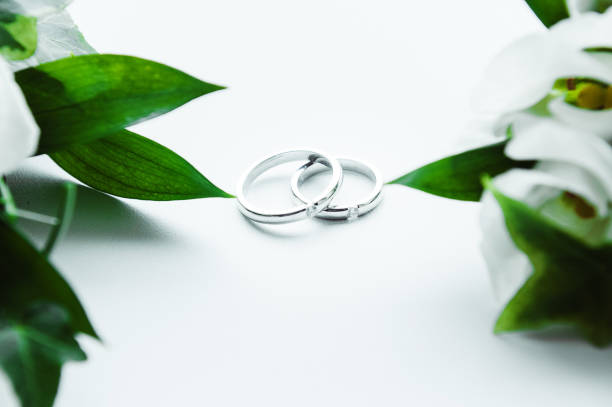 istock Two golden wedding rings, wedding rings background concept 946181376