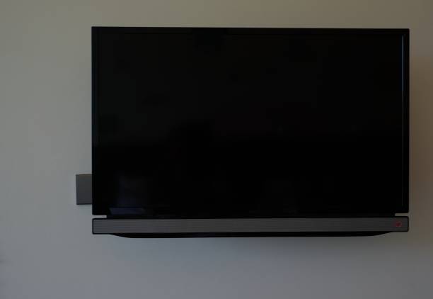 istock black television screen on the wall 946186784