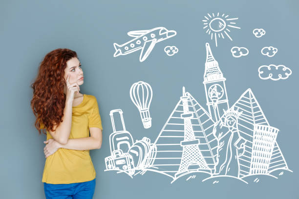 istock Thoughtful secretary choosing a country for her vacation 946192526