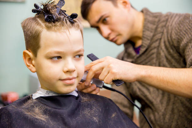 istock kid in barbershop 946196444