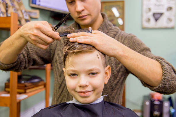 istock kid in barbershop 946197018