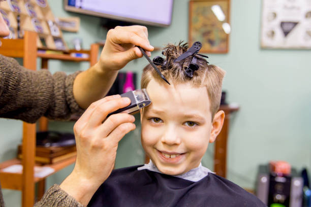istock kid in barbershop 946197530