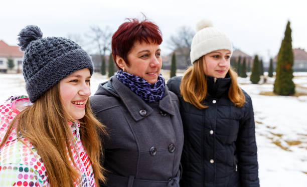 istock Happy mother with daughters 946210554