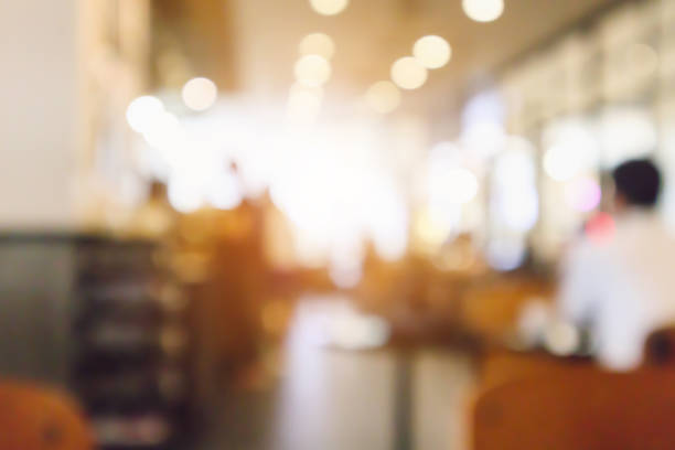 istock Restaurant cafe or coffee shop interior with people abstract defocused blur background 946210638