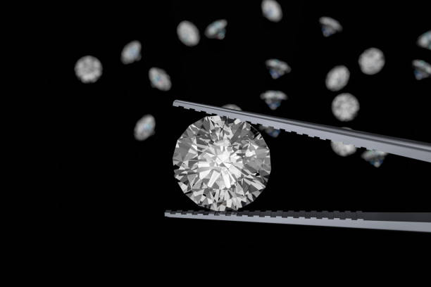 istock 3D rendering Luxury diamonds in tweezers  on black background 946219300
