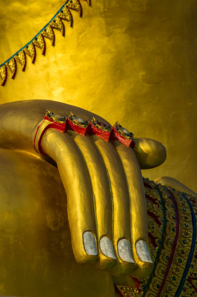istock Golden image of buddha hand thai style 946229570