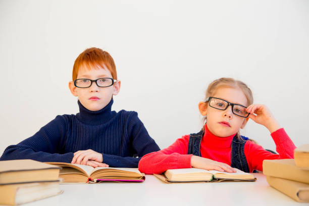 istock kids reading books 946236772