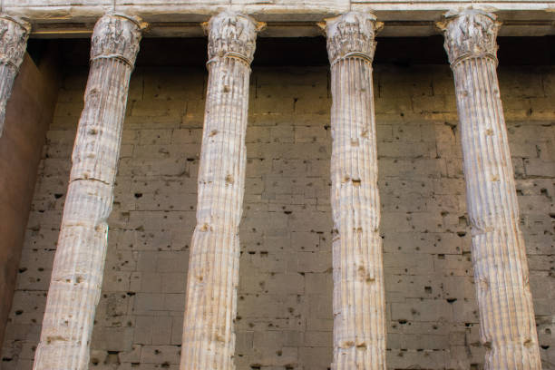 istock Ancient roman columns as background or pattern in rome italy 946240404
