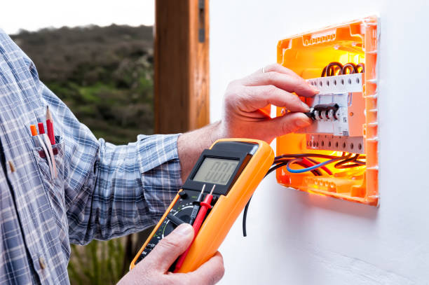 istock Electrician technician repairs the electrical panel of a residential system 946243118