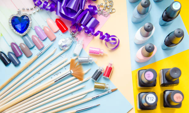 istock Make up set on pastel background top view. Manicure fashion modern bright background 946243412